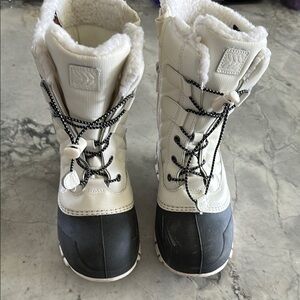 White and Black Winter Boots